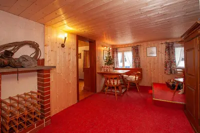 Ein Sitzbereich in der Unterkunft Alps Romantik