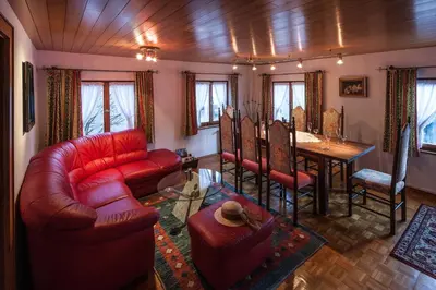 Ein Sitzbereich in der Unterkunft Alps Romantik