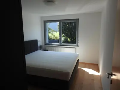 Ein Bett oder Betten in einem Zimmer der Unterkunft Ferienhaus Heinzle