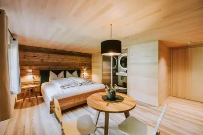 Ein Bett oder Betten in einem Zimmer der Unterkunft Gasthof Adler Schwarzenberg