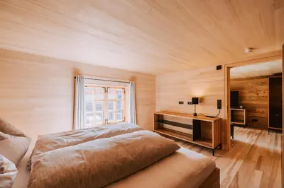 Ein Bett oder Betten in einem Zimmer der Unterkunft Gasthof Adler Schwarzenberg