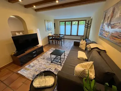 Ein Sitzbereich in der Unterkunft Ferienwohnung Hohenweiler