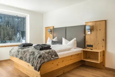 Ein Bett oder Betten in einem Zimmer der Unterkunft sDahoam Luxury Chalet