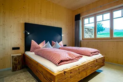 Ein Bett oder Betten in einem Zimmer der Unterkunft Naturzeithof
