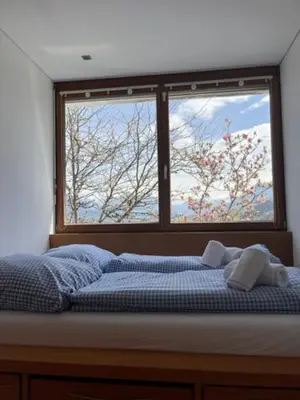 Ein Bett oder Betten in einem Zimmer der Unterkunft Villa Noomi