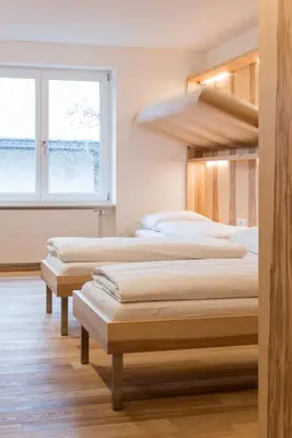 Ein Bett oder Betten in einem Zimmer der Unterkunft Bildungshaus Arbogast