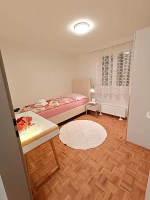 Ein Bett oder Betten in einem Zimmer der Unterkunft Luxus Apartment KFJ