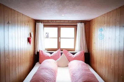 Ein Bett oder Betten in einem Zimmer der Unterkunft Sonnenhof