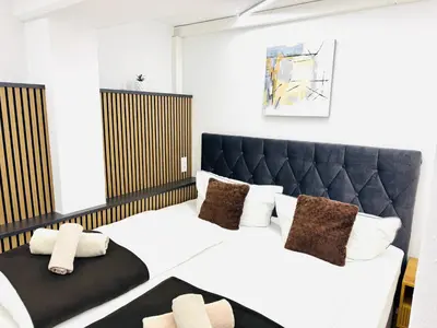 Ein Bett oder Betten in einem Zimmer der Unterkunft Ferienwohnung Wanderlust