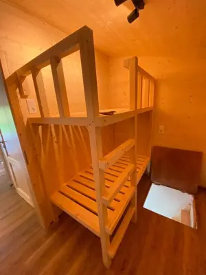Ein Bett oder Betten in einem Zimmer der Unterkunft Alpenhaus Flügelbeck - Selbstversorgung