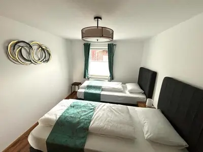 Ein Bett oder Betten in einem Zimmer der Unterkunft COVE Appart