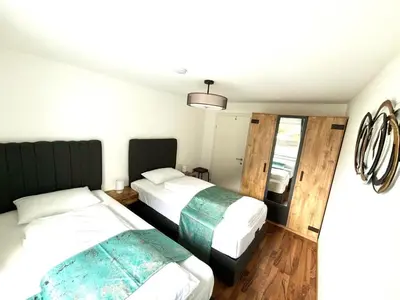 Ein Bett oder Betten in einem Zimmer der Unterkunft COVE Appart