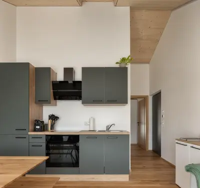 Küche/Küchenzeile in der Unterkunft KopfRausch Appartements