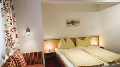 Ein Bett oder Betten in einem Zimmer der Unterkunft Haus Oberluggauer