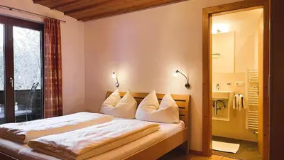 Ein Bett oder Betten in einem Zimmer der Unterkunft Haus Oberluggauer