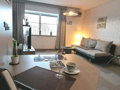 Ein Sitzbereich in der Unterkunft Business Apartments