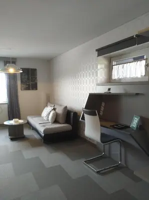 Ein Sitzbereich in der Unterkunft Business Apartments
