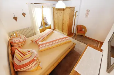 Ein Bett oder Betten in einem Zimmer der Unterkunft Haus Natalie