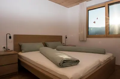 Ein Bett oder Betten in einem Zimmer der Unterkunft Ferienwohnung R45