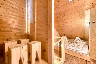 Ein Bett oder Betten in einem Zimmer der Unterkunft Alp Hütte Bregenzerwald