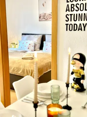 Ein Bett oder Betten in einem Zimmer der Unterkunft Wohnen direkt am Bregenzer Hafen