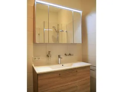 Ein Badezimmer in der Unterkunft Sonnalpin Waldhaus holiday residence