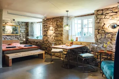Ein Bett oder Betten in einem Zimmer der Unterkunft Willkommen im Rustico - Deinem Rückzugsort zwischen Bergen und Bodensee