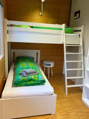 Ein Bett oder Betten in einem Zimmer der Unterkunft Villa Schaschl