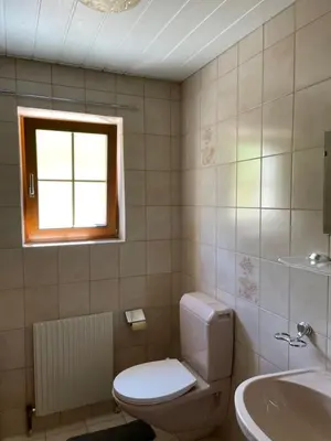 Ein Badezimmer in der Unterkunft Haus Heim
