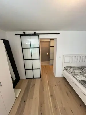 Ein Bett oder Betten in einem Zimmer der Unterkunft Gartenwohnung