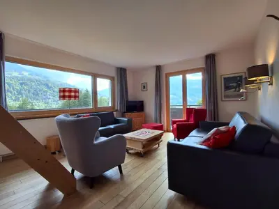 Ein Sitzbereich in der Unterkunft Ferienwohnung Enzian by Alpenfeder