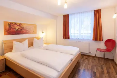 Ein Bett oder Betten in einem Zimmer der Unterkunft Sahin 5 by Alpenfeder