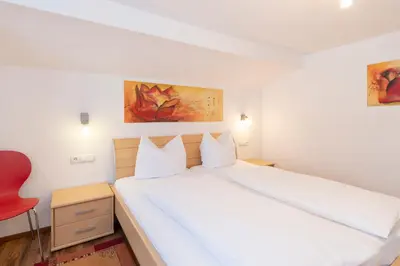 Ein Bett oder Betten in einem Zimmer der Unterkunft Sahin 6 by Alpenfeder