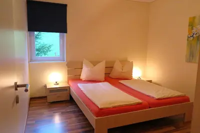 Ein Bett oder Betten in einem Zimmer der Unterkunft Alpina Central