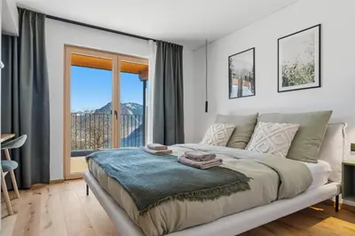 Ein Bett oder Betten in einem Zimmer der Unterkunft LAPURIS - brandnertal mountain retreat