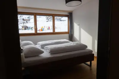 Ein Bett oder Betten in einem Zimmer der Unterkunft Berg Aparts Faschina - 14