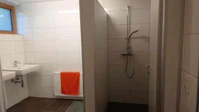 Ein Badezimmer in der Unterkunft Alpenvereinshaus