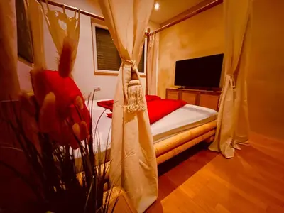 Ein Bett oder Betten in einem Zimmer der Unterkunft Loft 4-room
