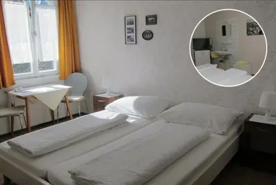 Ein Bett oder Betten in einem Zimmer der Unterkunft Pension Sonne Bed