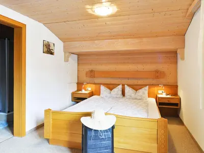 Ein Bett oder Betten in einem Zimmer der Unterkunft Pension Oberhauser