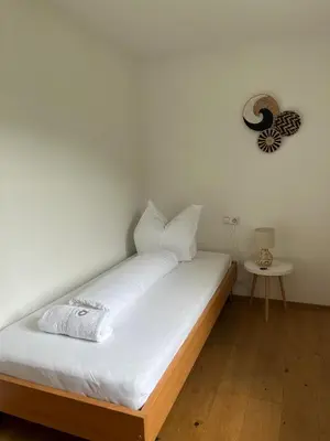 Ein Bett oder Betten in einem Zimmer der Unterkunft Schiller's Lakeside