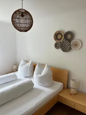 Ein Bett oder Betten in einem Zimmer der Unterkunft Schiller's Lakeside