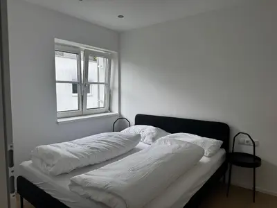 Ein Bett oder Betten in einem Zimmer der Unterkunft Bauern 65