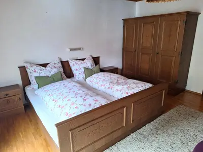 Ein Bett oder Betten in einem Zimmer der Unterkunft Ferienwohnung Rüf