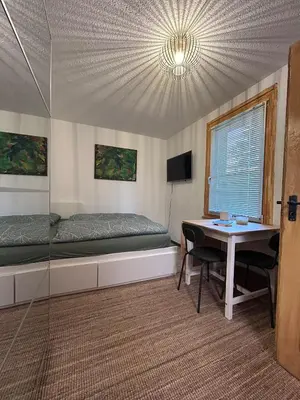 Ein Bett oder Betten in einem Zimmer der Unterkunft See oder Berg, Stadt oder Natur