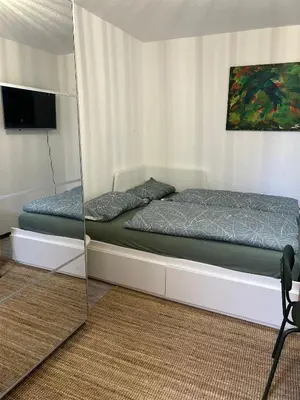 Ein Bett oder Betten in einem Zimmer der Unterkunft See oder Berg, Stadt oder Natur