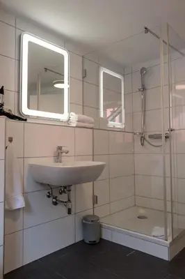 Ein Badezimmer in der Unterkunft Retro-Style in der Bregenzer Fussgängerzone