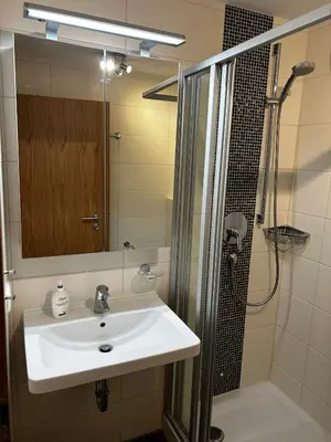 Ein Badezimmer in der Unterkunft Bergtraum Aparthotel