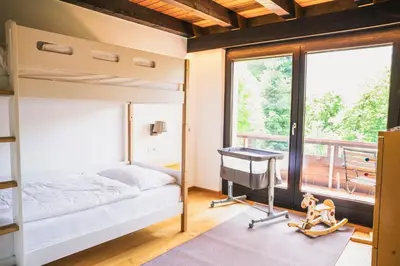 Ein Bett oder Betten in einem Zimmer der Unterkunft Villa Werdenberg