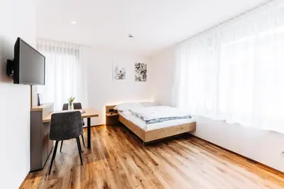 Ein Bett oder Betten in einem Zimmer der Unterkunft Bright & Modern Studios in Haselstauden